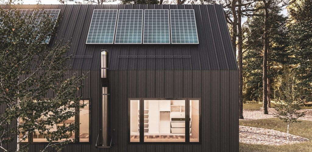 dom w stylu nowoczesnej stodoły z panelami słonecznymi na dachu